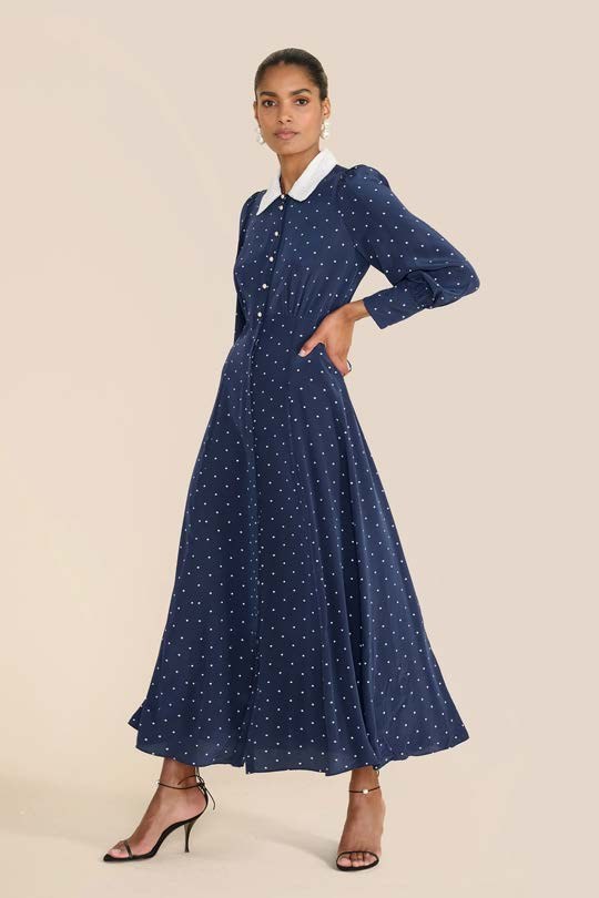 Beulah London navy polka dot dress photographed on model for ecommerce