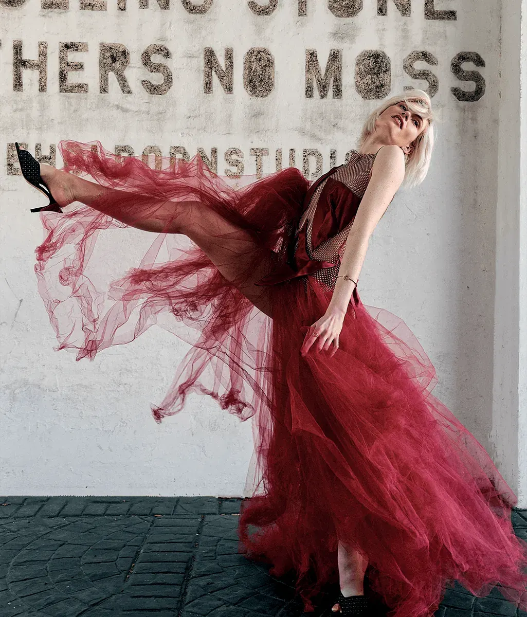 Editorial fashion frame of a red tulle dress