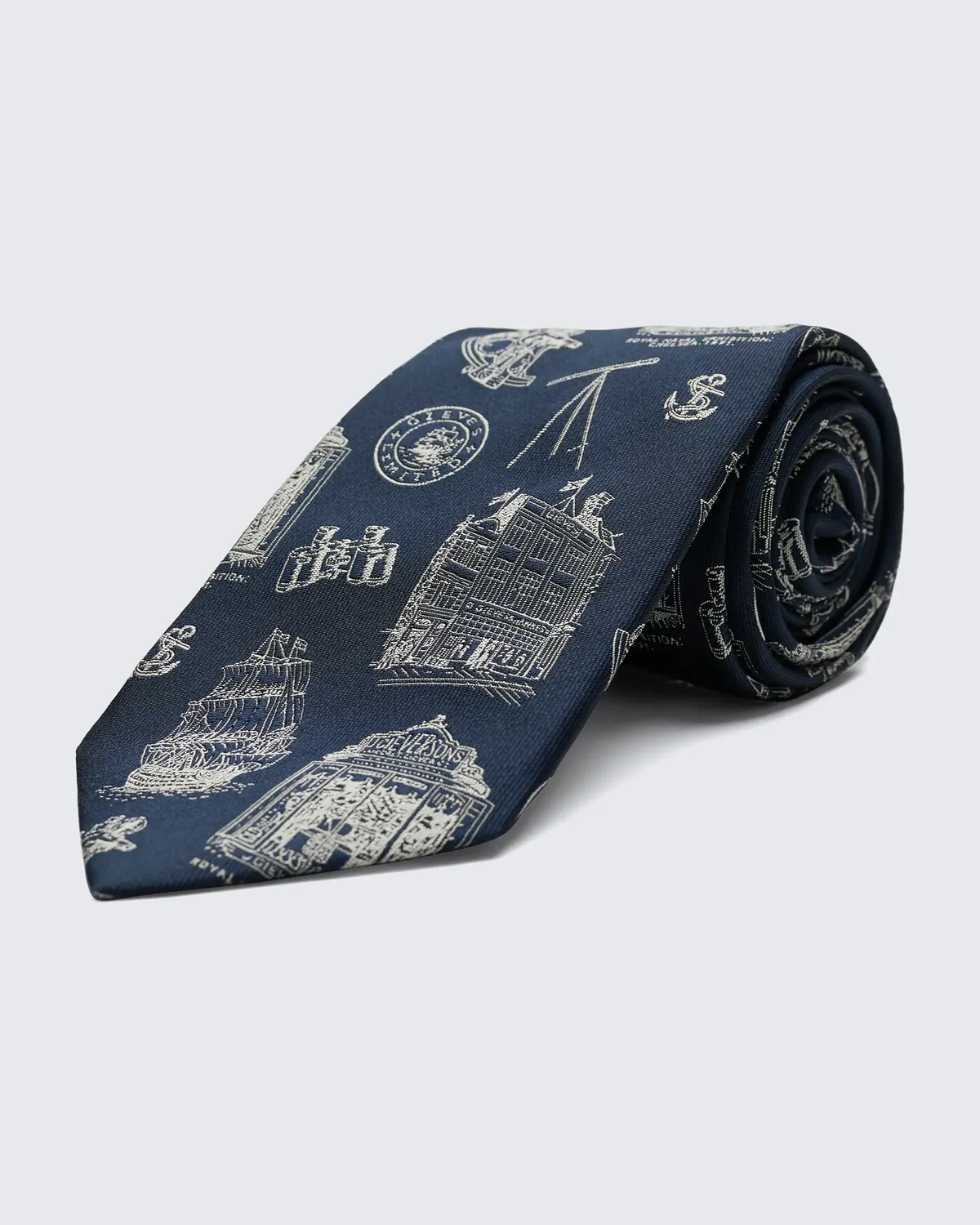 Navy and white tie photographed on a clean background