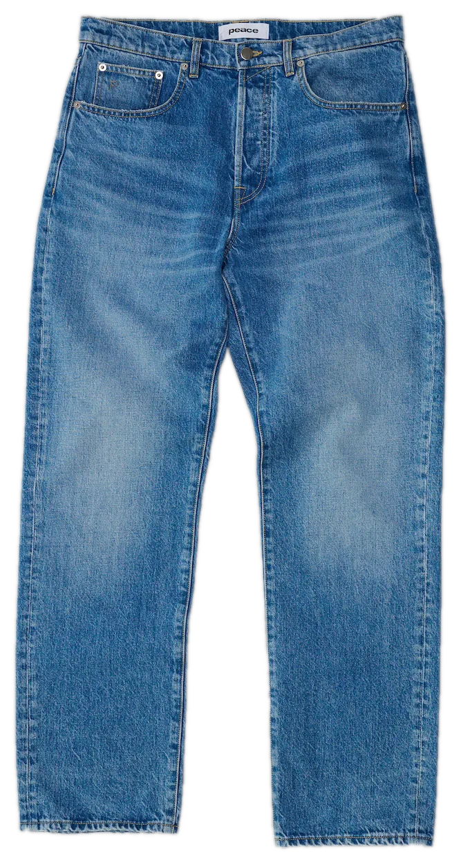 Mid blue tapered jeans flat lay photography